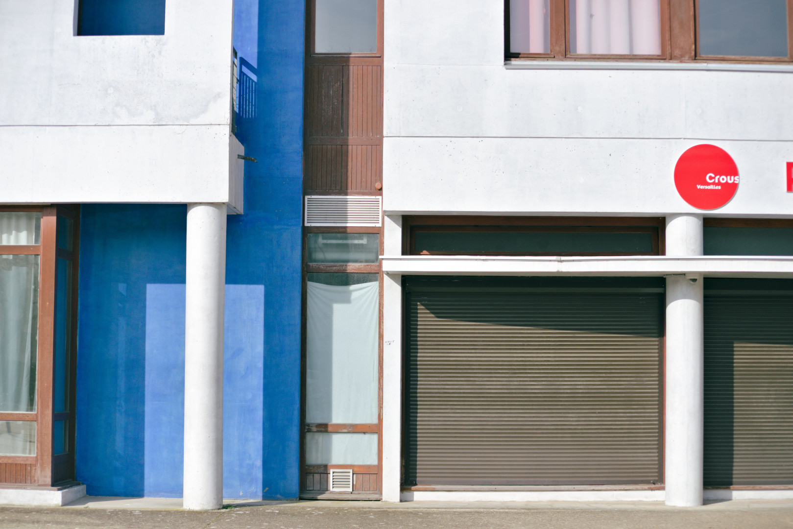 A geometric pattern of shapes and colour on a building façade